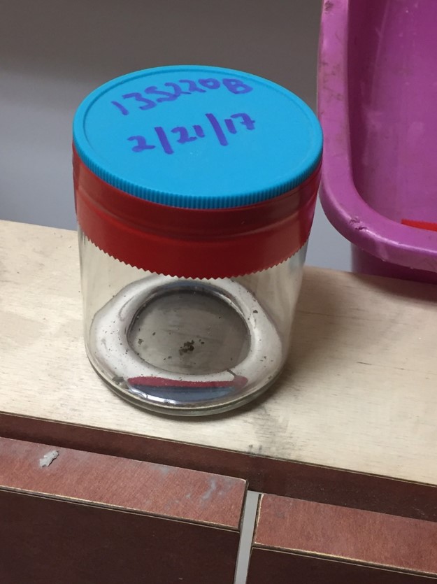 Elemental mercury removed from a decommissioning site contained in a glass vial.